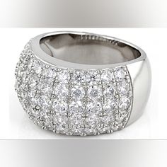 925 Sterling Silver Pave Cubic Zirconia Band Ring Size: 7 Brand New Without Tags Made With Solid .925 Sterling Silver Domed, Wide Band Pave Design Of 5.64 Ctw Cubic Zirconia Gemstones (35 In Total) Stamped '925' And Signed With Jeweler's Hallmark. Weight: 9g (Approx.) Excellent Condition! No Flaws. About Me: I'm Disabled With A Severe Chronic Illness Condition That Has Left Me Unable To Work. I Have No Savings, No Income, And No Financial Support Of Any Kind. Please Know That By Supporting My Po Diamond White Diamond Ring With Sparkling Stones, Silver Crystal Ring With Pave Setting, Classic White Gold Rings With Bling, Classic Cubic Zirconia Rings With Sparkling Stones, White Gold Cubic Zirconia Crystal Ring With Sparkling Stones, Classic Silver Diamond Ring With Bling, White Gold Cubic Zirconia Ring With Sparkling Stones, Classic Silver Rings With Bling, Classic Silver Ring With Bling