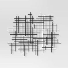 an abstract black and white photo with lines in the shape of squares on a gray background