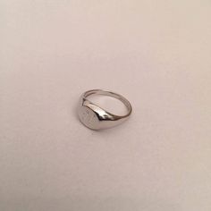 "Silver Pinky ring, Engraved ring, Initial Ring, Personalized Ring, silver letter ring, sterling silver - also suitable for men and women, Diameter: aprox' 0.7 mm = 0.27\" Please note in the \"notes to seller\" at checkout. : * state your ring size * letter you want to apper or to leave it blank The product will arrive to you packed in gift box and padded envelope to maintain the product For more rings from us: https://www.etsy.com/il-en/shop/Limajewelry?section_id=16284797&ref=shopsection_l Minimalist Engraved Initial Ring In Sterling Silver, Silver Engraved Ring With Initials For Promise, Silver Engraved Promise Ring With Initials, White Gold Initial Ring Stamped 925 For Promise, Classic Open Ring Initial Stamped 925, Oval Silver Initial Ring For Gift, Classic Open Ring With Stamped 925 Initial, Elegant Silver Engraved Midi Rings, Silver Classic Signet Ring For Promise