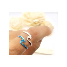 "The Wave of Aloha. This ring reminds us the time at the beach of Hawaii, Florida, or the Caribbean. We watched and listened to the the ocean waves. This ring is cute, dainty, and fun to wear. It's made to wear. It DOES NOT tarnish. It DOES NOT peel or turn green on your skin. It's safe for children. Superb Craftmanship: Solid sterling silver (92.5% silver and 7.5% copper). No nickel. Good for those with sensitive skin. Flawlessly hand crafted and inlaid with small pieces of lab created blue or Handmade Blue Toe Ring Jewelry, Adjustable White Toe Rings For Gift, Adjustable White Toe Rings As Gift, Blue Open Midi Rings, Nickel-free Blue Stackable Rings As A Gift, Adjustable Blue Open Ring Jewelry, Adjustable Blue Midi Promise Rings, Blue Open Midi Rings As Gift, Handmade Blue Open Midi Ring