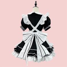 Japanese Lolita Maid Dress Condition: Brand NewColor: BlackSize: S-5XLMaterial: Cotton and PolyesterSleeves: Short SleevesIncluded: Dress+Apron+Headwear+Bow*2 Black Ruffled Mini Dress For Costume Party, White Short Sleeve Dress For Cosplay, Fitted Black Cosplay Dress, Fitted Black Dress For Cosplay, Black Fitted Costume Dress, Black Harajuku Dress For Cosplay Events, Short Sleeve Cosplay Costume For Costume Party, Harajuku Anime Print Dress For Halloween, Fitted Harajuku Dress For Costume Party