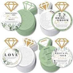 wedding stationery cards with gold foil and diamonds on the top, surrounded by greenery