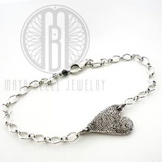 Custom Paw print bracelet - Maya Belle Jewelry Elegant Sterling Silver Heart Bracelet Nickel Free, Elegant Sterling Silver Nickel-free Heart Bracelet, Elegant Nickel-free Sterling Silver Heart Bracelet, Sterling Silver Keepsake Bracelet, Sterling Silver Keepsake Bracelets In Silver, Dainty Sterling Silver Heart Bracelet For Everyday, Dainty Engraved Bracelet Jewelry, Sterling Silver White Gold Bracelet For Promise, Sterling Silver White Gold Promise Bracelet