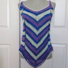 "Soft cotton yarn makes up this delightful and playful striped summer tank top.  Perfect weight for the season with a flattering diagonal stripe pattern on both front and back. The color and pattern is royal blue,light blue and purple striping which follows the dictate of the colors in the yarn.  It will fit a woman's size  medium.  Top can be worn over a bathing suit, camisole or halter top layered. or by itself.   Measurements: ( taken lying flat)                               Bust, 36\"- 38\"                               Hip Area  36\"-40\"                               Under Arm Side  12 1/2\", over all length from shoulder to peak on hem is 28\". There is comfortable stretch in excess of those measurements giving the top a wonderful drape. All of my tank tops and camisoles are hand k Summer Knit Top, Diagonal Stripes Pattern, Summer Knit Tops, Knit Tank Top, Yarn Sizes, Summer Tank, Diagonal Stripes, Summer Tank Tops, Tank Top Camisole