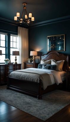 a bedroom with dark blue walls and wooden furniture, including a large bed in the center