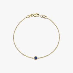 Our simple and elegant solitaire bracelet features a round cut natural blue sapphire at its center. We can craft this bracelet in 14K or 18K Gold according to your preference.★ Bracelet Features• Gold Kt: 14K/18K Solid Gold (All pieces are stamped for authenticity)• Available Gold Colors: Yellow Gold, Rose Gold, White Gold• Center Round Cut Sapphire Weight: 0.15 carat• We only work with real natural sapphires• We offer a signed certificate with each bracelet for the authenticity of the center sapphire stone.• Center Diameter: 4.6 mm Timeless Blue Round Bracelets, 14k Gold Diamond Bracelet With Birthstone, 14k Gold Round Diamond Bracelet With Birthstone, Classic Yellow Gold Bracelet With Birthstone, Classic Yellow Gold Birthstone Bracelet, Classic Gold Bracelet With Birthstone, 14k Gold Bracelet With Birthstone, 14k Gold Birthstone Bracelets, 14k Gold Birthstone Bracelet