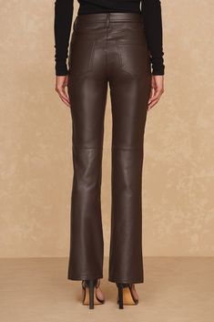 The Kai Pant is a faux leather Fall essential. With a flattering high-rise and skinny-flare silhouette that gives you legs for days, this signature pant is a must for on-trend style. Featuring silver hardware and luxuriously soft, ultra stretchy faux leather, this pant looks incredible on everyone. Leather Pant, Fall Essentials, Trend Style, Silver Hardware, Jumpsuit Dress, Best Sellers, High Rise, Jumpsuit, Faux Leather