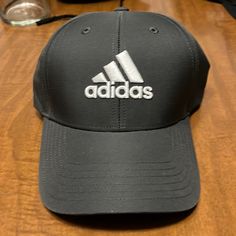 Never Worn Adidas Black Visor Hat, Black Adidas Visor Hat, Adidas Black Hat With Curved Brim, Adidas Black Baseball Cap With Curved Brim, Black Curved Brim Baseball Cap For Golf, Casual Black Hat With Adidas Logo, Sporty Black Adidas Logo Hat, Casual Black Adidas Logo Hat, Black Casual Adidas Hat