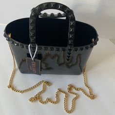 Gorgeous! The Studs Make It Look High End. Comes With A Good Chain That Is Removable. Has A Sparkling Shimmer To Make It Look Elegant. You Will Love It!! Top Handle Bag With Chain Strap For Night Out, Black Crossbody Bag As Fashion Accessory, Trendy Black Evening Bags, Black Shoulder Bag With Detachable Handle For Night Out, Black Bag With Detachable Handle For Night Out, Black Top Handle Bag For Night Out, Black Satchel Bag For Night Out, Black Satchel For Night Out, Black Shoulder Bag With Adjustable Strap For Party