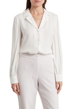 Feminine Button-up Blouse With Button Cuffs, Chic Semi-formal Blouse With Hidden Button Closure, Long Sleeve Blouse With Button Closure For Work, Elegant V-neck Shirt With Back Button Closure, Long Sleeve Office Blouse With Placket, Office Long Sleeve Blouse With Button Closure, Long Sleeve Blouse With Placket For Office Wear, Office Wear Long Sleeve Blouse With Placket, Office Button-up Blouse With Hidden Button Closure