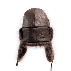 Beaver aviator with French lamb cover and chin strap. Shell: 100% Lambskin Leather Trim: 100% Natural Beaver Lining: 100% Polyester Quilted Lining Made in Canada Washing Instructions: Professional Fur/Leather Clean Only Crown Cap, Ivy Cap, Luxury Hats, Aviator Hat, Leather Hats, Fur Hat, Leather Cleaning, Earmuffs, Mitten Gloves