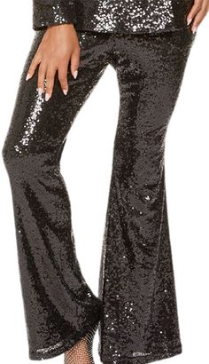 Introducing the Love the Queen 17499-Church Pants that encapsulate sophistication with a touch of sparkle for the modern woman. The pants feature a striking flare design that adds a classic yet contemporary silhouette to any ensemble. Adorned with shimmering sequins throughout, these pants are guaranteed to turn heads and make a statement wherever you go. The comfort-fit waistband ensures these pants sit comfortably at the midsection, offering both comfort and style without compromising on either. Designed to flatter various body types, they provide ample movement for an effortlessly chic look. The high-quality fabric blend allows for a soft touch, while the durability ensures they can be a go-to piece in your wardrobe for years to come. Whether attending a church service, participating in Church Suits, Church Service, The Queen, Modern Woman, Fashion Games, Body Types, The Modern, Black Pants, Timeless Design