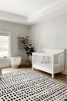 With these paint colors you can create a calming and serene space for your new baby. See what's trending for baby girl, boy, and gender neutral rooms. Nursery Paint Colors Benjamin Moore, Nursery White Crib, Paper White Benjamin Moore, Style The Bump, Nursery Accents, Gender Neutral Baby Nursery