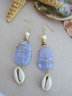 Aqua Chalcedony and freshwater pearl earrings with cowrie shells. Handmade Cowrie Shell Earrings As Gift, Handmade Cowrie Shell Earrings For Gift, Bohemian Cowrie Shell Earrings For Gift, Bohemian Cowrie Shell Earrings As Gift, Bohemian Mother Of Pearl Earrings For Beach, Summer Blue Shell Jewelry, Beach Drop Earrings With Natural Stones, Beach Earrings Made Of Mother Of Pearl, Blue Shell Jewelry For Gifts