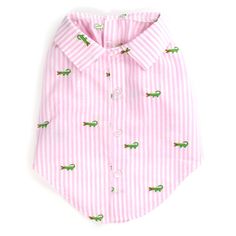 a pink and white striped shirt with alligators on the collar, in front of a white background