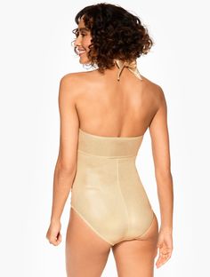 Make this Sun Ocean Sand one-piece swimsuit a poolside favorite this season. Designed with a twist detail at the bust and an adjustable halter neck with removable straps. Complete with UPF 50+ protection. Features One Piece Halter Neck Lined Soft Cup Adjustable & Removable Straps SunWell UPF 50+ Sun Ocean Sand Imported Material: Body: 85% Nylon, 15% Spandex; Lining: 92% Polyester, 8% Spandex Care: Hand Wash Cold; Do Not Wring Or Twist; Only Non-Chlorine Bleach When Needed; Line Dry; Do Not Iron; Ocean Sand, Soft Cup, Modern Classic, Upf 50, Halter Neck, One Piece Swimsuit, Bleach, Hand Wash, Twist