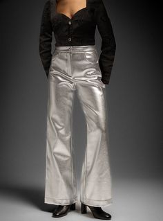 Regular-fit metallic pants. with 2 front pockets for using them all day long. Go to the office or the dance floor, get them, or regret itHandmade in BarcelonaWe produce every item one by one on demandPrices so low for exclusive designs handmade in Europe need some patienceGetting you the best deals for luxury quality products with minimal environmental impact requires a little more waitingAs no material or energy is misused to make this on-demand piece, we can offer a better price. What is good Silver Pants, Metallic Pants, Pants Wide Leg, Beauty Bag, Socks And Hosiery, Environmental Impact, Cardigan Coat, Dance Floor, The Dance