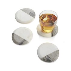 three marble coasters with drinks in them