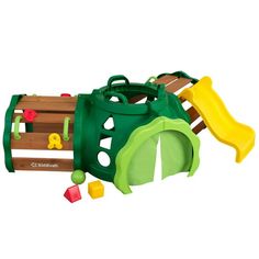 a wooden play set with green and yellow slides