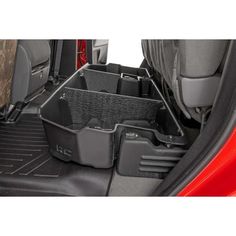 Clean up the contents of your cab with Rough Countrys Custom-Fit Under Seat Storage Compartment. These handy under seat truck storage compartments offer an easy way to store your gear with a custom, contoured look that blends in seamlessly with your vehicles factory design. Keep your tools, gear, and other odds and ends organized and stowed away while conveniently stowed away under the rear seats. Each under seat storage tray is constructed from a durable, high-density thermoplastic material tha Toyota Tundra Accessories, Tundra Accessories, Truck Bed Organization, Under Seat Storage, Cool Truck Accessories, Chevy Trucks Silverado