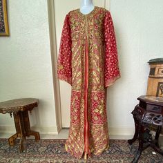 Reduced! New Large Traditional Style Kaftan Dress. Fully Lined. Shoulder Pads. Matching Scarf Included. This Can Easily Be Worn With A Belt For A Smaller Waist Or Clip And Gathered With A Brooch In The Back. Approximately 58” In Length Model Is 5’7.5” And 125lbs No Trades. Bundle And Save! Abaya Hijab Eid Modest Wear Modest Clothing Modest Dress Dishdasha Traditional Dress Thob Jilbab Middle Eastern Dress Henna Dress Wedding Guest Dress Kaftan Red Embroidered Silk Kaftan, Elegant Red Kaftan With Zari Work, Red Floor-length Kaftan With Zari Work, Red Kaftan With Zari Work For Wedding, Traditional Red Kaftan With Dupatta, Red Anarkali Kaftan With Dabka Work, Anarkali Red Kaftan With Dabka Work, Red Silk Kaftan For Wedding, Red Floor-length Kaftan With Resham Embroidery