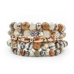 ERIMISH EXTENDED TRUFFLE 5 BRACELET STACK INFO Treat yourself to a luxurious and timeless look with the Truffle Stack. A perfect everyday bracelet stack featuring a great neutral tone for year around wear. Crafted with care and attention to detail, the Truffle Stack is your go-to for a fashionable and reliable look. Lead & Nickel Free Bracelets are 'one size fits most' and are designed to fit wrists up to 8.5" comfortably. Please be aware that due to the unique and handmade nature of each product, colors, shapes, and bead sizes may vary slightly from the photos and descriptions. Stretch Beaded Bracelets Diy, Erimish Bracelets, Stretch Beaded Bracelets, Blessing Beads, Stack Bracelet, Sparkle Bracelet, Bling Earrings, Bead Sizes, Everyday Bracelet