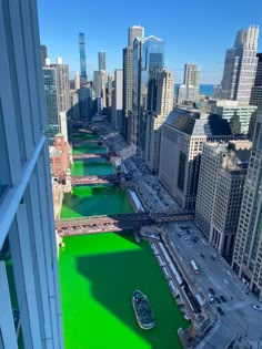 an aerial view of the chicago river dyed green for st patrick's day