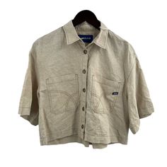 Gas Jeans Linen Blend Nausyca Button Front Shirt Size Small New. Button Front Collared Shirt Two Large Chest Pockets Relaxed Fit Cotton Linen Blend New With Tags Armpit To Armpit 22" Length 21" Casual Beige Tops With Snap Buttons, Beige Button-up Top With Placket, Casual Beige Button-up Tops, Casual Beige Tops With Button Closure, Trendy Beige Shirt With Buttons, Casual Beige Blouse With Buttons, Casual Button-up Tops With Buttoned Pockets, Beige Button-up Top With Button Cuffs, Casual Tops With Buttoned Pockets For Work