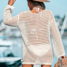 Take your vacation look to the next level with this sheer crochet knit swim cover-up featuring a scoop neck, dropped long sleeves, and a mini hem. Whether you're lounging by the pool or strolling along the shoreline, our sheer crochet knit swim cover-up is the perfect addition to complete your vacation ensemble. Embrace its effortless charm and enjoy the freedom and comfort it provides. Product Code: CAA07A3A005GG/CAA07A3A005PP/CAA07A3A005GH,CAA07A3A005AA Summer Open Knit Swimwear For Beach Cover-up, Fitted Crochet Cover-up For Vacation, Long Sleeve Open Knit Cover-up For Beachwear, Long Sleeve Open Knit Beach Cover-up, Stretch Open Knit Beach Cover-up, Vacation Looks, Shipt Shopper, Knit Tunic, Swim Cover