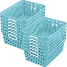 two gray plastic baskets sitting next to each other