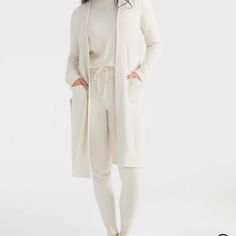 Made With Our Dreamy Cozzzy Fabric, This Relaxed Fit, Ultra-Soft, And Unbelted Robe Is Perfect For Layering Over Your At-Home Or On-The-Go Outfit. Pair It With The Cozzzy Track Pant For The Ultimate In Chill. This Relaxed Fit, Unbelted Robe Features Patch Pockets And Side Slits. Length Hits Just Below The Knee. Machine Wash Cold, Gentle Cycle, Do Not Bleach, Reshape And Lay Flat To Dry, Do Not Iron 87% Nylon, 13% Rayon Chic Soft Texture Cardigan For Loungewear, Chic Cream Sweater Coat For Layering, Fitted Cream Sweater Coat With Long Sleeves, Long Sleeve Cardigan With Soft Texture For Loungewear, Elegant Knit Sweater Coat For Loungewear, Elegant Cream Sweater For Loungewear, Chic White Sweater Coat For Loungewear, Soft Long Sleeve Cardigan For Loungewear, Soft Texture Long Sleeve Cardigan For Loungewear