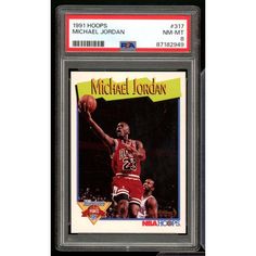 michael jordan basketball card from the 1970 - 71 topps graded with an autographed photo