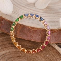 A beautiful gift for Mom, this colorful Scalloped Pave Rainbow Sapphire Eternity Band is a true celebration of family. The full eternity rainbow sapphire band is designed with beaded decor & scalloped pave, making the Eternity Ring in Rainbow Sapphire stronger & suitable for everday wear. ◆ Product Specifications ※18K Rose gold ※Rainbow Color Natural Sapphire, 2.0mm Round Cut ※Setting: Scalloped Prong ※Made in the USA ★Procedure information Please select the style, material, and size from the dr Rainbow Wedding Ring, Rainbow Ring, Rainbow Sapphire Ring, Rainbow Eternity Ring, Rainbow Wedding Band, Rainbow Multi-stone Sapphire Ring, Fine Jewelry Rainbow Multi-stone Rings, 14k Gold Rainbow Multi-stone Rings, 14k Gold Rainbow Rings With Multi-stone