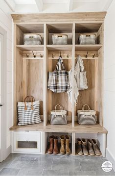 an organized mud room with shoes, bags and purses on the shelf next to it