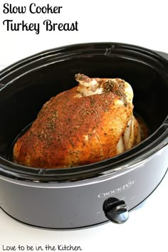 slow cooker turkey breast in the crock pot with text overlay reading slow cooker turkey breast love to be in the kitchen