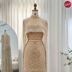 Indulge in the luxurious design of Dreamy Vow's Champagne Evening Dress. Adorned with pearls and a cape, this stunning Arabic-style gown will make you feel like royalty at any wedding or party. The mermaid silhouette is sure to flatter and wow, making it a must-have for any special occasion. India Wedding Outfits, Arabic Women, Yellow Evening Dresses, Grey Evening Dresses, Sequin Cape, Champagne Evening Dress, Beautiful Bridal Dresses, Green Evening Dress, Gold Evening Dresses