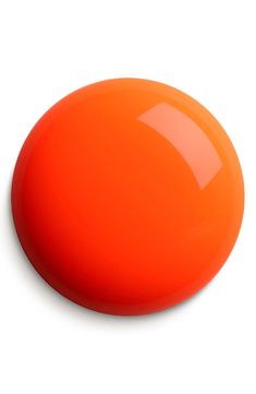 an orange round object on a white background