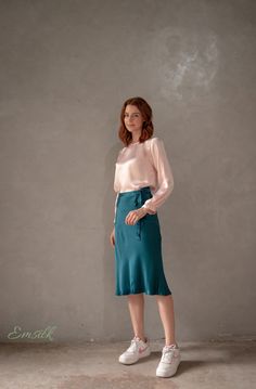 "This luxury exclusive design silk skirt is perfect for fall and winter. 100 % designed and handmade by Emsilk. I am pleased to offer your garments made to measure at no extra cost. All of my designs can be made in any colors that you see in my shop. Link to all colors in pure silk: https://www.etsy.com/shop/emsilkdesign?ref=seller-platform-mcnav&section_id=28483599 * Detail: - Slip skirts go with any tops and beautiful all year around. - Midi skirt - bow tied straps - Below the knee/ or len Feminine Silk Flared Skirt, Chic Silk Skirt For Fall, Feminine Silk Midi Skirt, Elegant Silk Wrap Skirt For Spring, Silk Long Wrap Skirt With Relaxed Fit, Chic Silk Lined Wrap Skirt, Silk Wrap Skirt With Relaxed Fit, Chic Silk Wrap Skirt With Lining, Relaxed Silk Midi Pencil Skirt