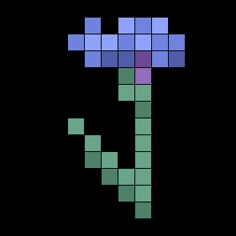 a cross stitch pattern with blue and green squares in the shape of a letter t