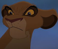 the lion from disney's live - in - the - wild is looking at something