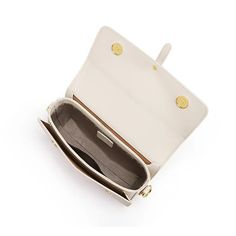 Discover Elegance and Versatility Step into the season with sophistication using our exclusive White Leather Crossbody & Shoulder Bag. Designed for the fashion-forward woman, this bag embodies elegance and versatility, perfectly complementing your spring and summer wardrobe. Whether you're attending a daytime event or an evening soiree, this bag seamlessly adapts to all occasions, ensuring you always step out in style. Premium Quality and Design Crafted with genuine cow leather, this bag boasts a soft, luxurious texture that's both durable and stylish. The saddle shape design, combined with a solid pattern and a flap pocket exterior, offers a classic yet contemporary look. Its multiple interior compartments, including a slot pocket, zipper pocket, and a spacious main compartment, provide a Spring Formal Satchel With Double Handle, Elegant Crossbody Satchel With Removable Pouch, Elegant Satchel Shoulder Bag For Travel, Chic Flap Bag With Removable Pouch For Daily Use, Top Handle Clutch For Travel, Classic Crossbody Evening Bag For Travel, Formal Tote Satchel For Spring, Elegant Leather Bags For Spring, Formal Spring Satchel Tote