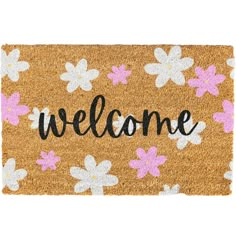 a welcome mat with pink and white flowers on the front, that says welcome written in black ink