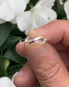 Infinity Sterling Silver Ring | The Life Divine Infinity RingThe Infinity symbol signifies the concept of limitlessness or eternity and balance. Think love, for it is infinite, boundless and everywhere.Sterling Silver Infinity Ring measures 1/2" W x 1/4" H