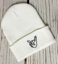 Keep on rockin' with this rock on beanie. ✷ Cuffed Beanie with Embroidered Rock On Hand Sign ✷ Choose Color from Drop Down Menu ✷ One Size fits all ✷ 100% Acrylic ✷ Great fit and soft quality - Guaranteed! ✷ Still don't see the color combination you want? Just ask we can usually make it for you :) ✷ Shipping from sunny California ✷ Embroidered here at The One Stop Outlet ✷ If you have any questions or concerns please feel free to send us a message! ✷ Have a design idea of your own? We do custom Rock On Hand Sign, Beanie Embroidery, Rock On Hand, Beanies For Men, Beanies For Women, Rock Hand, Men's Beanies, Hand Sign, Embroidered Beanie