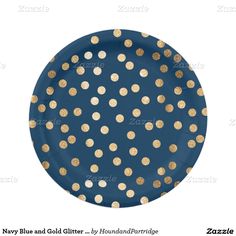 pink and gold polka dot paper plate with gold foil dots on the bottom, in front of a white background