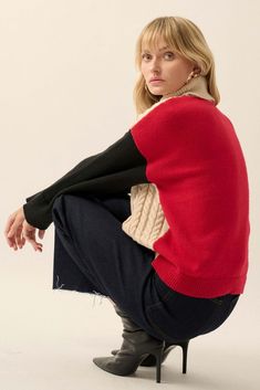 Colorblock knit sweater. Cable knit front. Contrasting color sleeves and back. High turtleneck collar. Long sleeves. Drop shoulder. Ribbed knit collar, cuffs, and hem. Relaxed fit. 100% Polyester. Imported. Designed in LA. Model wears size S. Color Block Sweater For Fall Layering, Winter Cable Knit Sweater Vest For Layering, Cozy Fall Sweater With Contrast Color, Fall Color Block Crew Neck Outerwear, Winter Knit Sweater With Contrast Color, Winter Layering Sweater Vest, Winter Turtleneck Polo Sweater For Layering, Trendy Contrast Color Sweater For Layering, Cable Knit Turtleneck Sweater For Layering