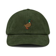 Waterfowl hunting (also called wildfowling or waterfowl shooting in the UK) is the practice of hunting ducks, geese, or other waterfowl for food and sport. Trendy cap for a modern outfit. The corduroy fabric has always stood the test of time thanks to its best qualities - softness, affordability and durability - and not only protects you from the sun, but is the perfect accessory for your casual or sporty outfit. * 100% cotton corduroy * Soft, unstructured crown * Cotton twill sweatband and tapi Joker Hat, Camping Hat, Embroidered Corduroy, Corduroy Hat, Hats And Caps, Dad Cap, Frog And Toad, Corduroy Fabric, Embroidered Hats