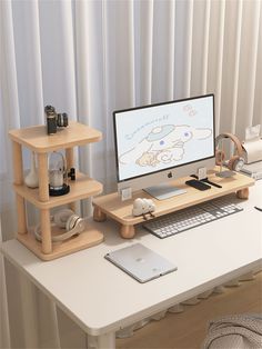 a desk with a computer, keyboard and mouse on it