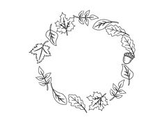 a circle made up of leaves and acorns