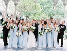 a large group of people in formal wear